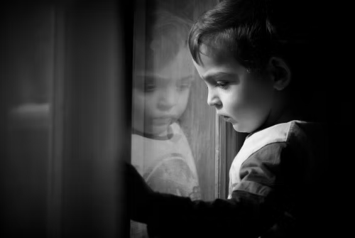 Child at window
